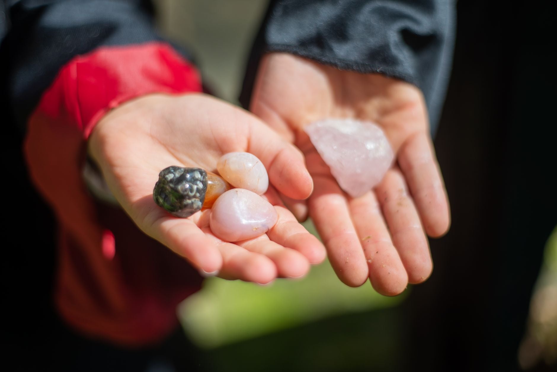 Hands holding a crystal, the practice of crystal healing