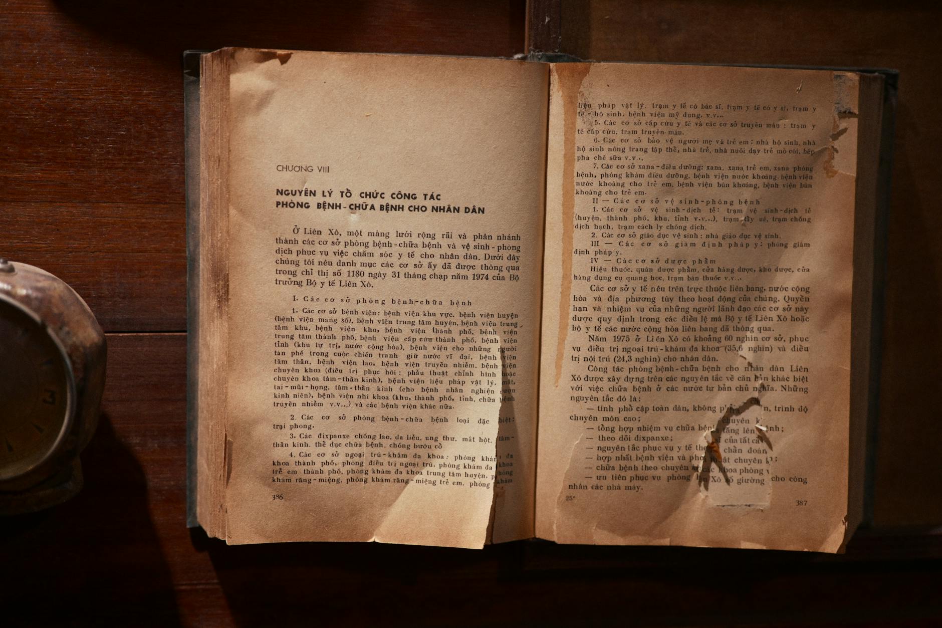 An open vintage book, returning to the hermetic source teachings
