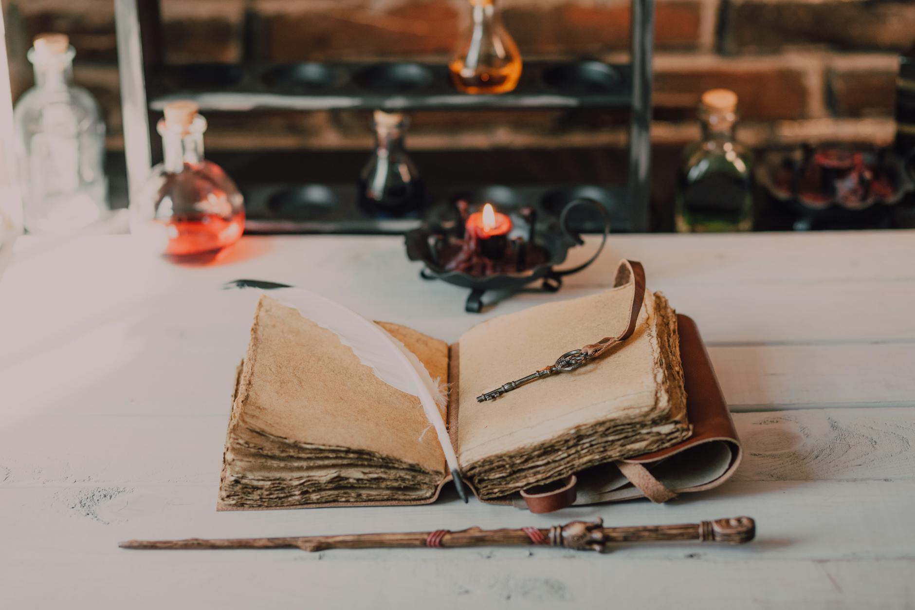 A key resting on an old book, the Hermetic Principles as keys to operational practice