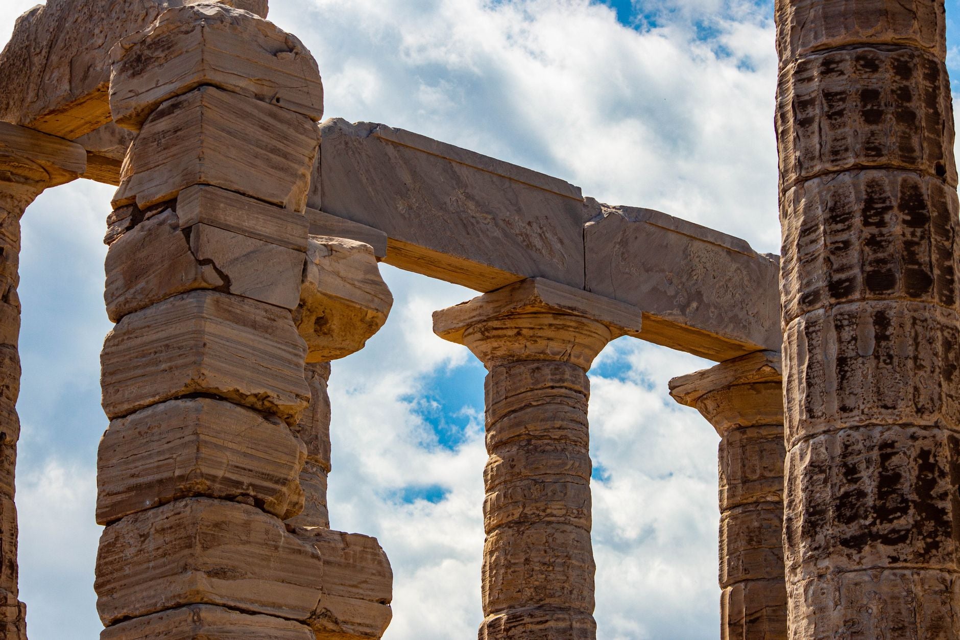 Ancient temple columns against the sky, the classical roots of the Hermetic Principles