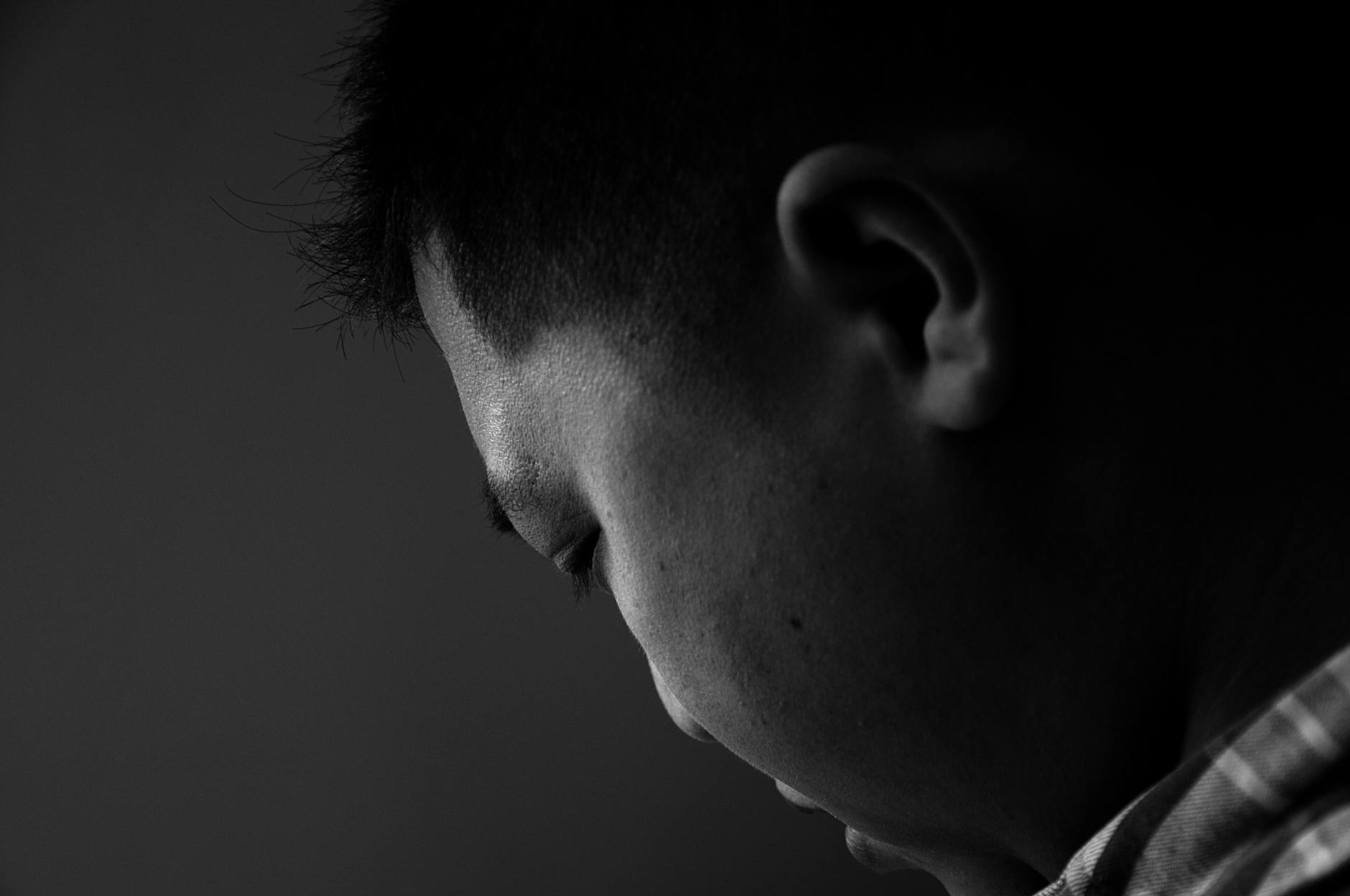 A human head in profile, representing consciousness as the primary substance of reality